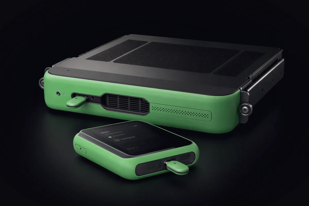 Two identical install keys, one plugged into a server sled and one into a pocket deck lying in front of it